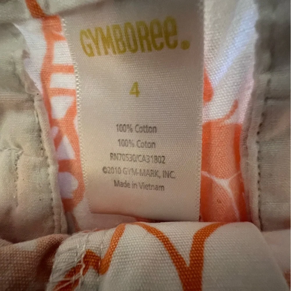 GYMBOREE GIRLS PULL ON SHORTS.  SIZE 4   Light Orange & White Floral